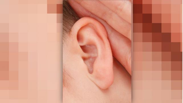 closeup of ear listening